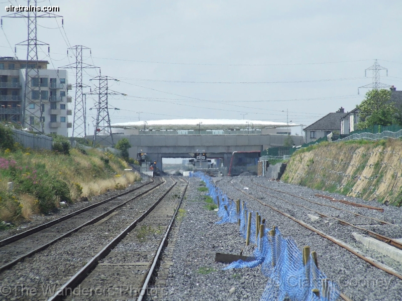 Cherry Orchard_20080726_001_CC_JA.jpg - View looking south towards Cork from the end of the up platform at Cherry Orchard Station. In the distance is the new 'Park West & Cherry Orchard Station'. ©The Wanderers Irish Rail Photos